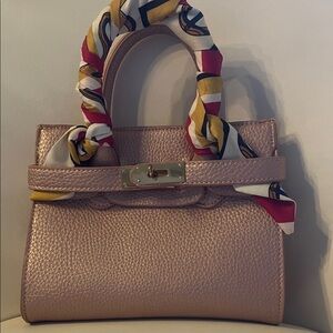 Elegant Pink Handbag with Scarf Accent